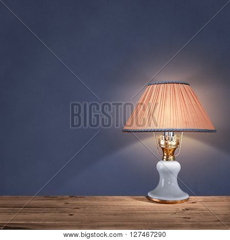 vintage table lamp on a blue background