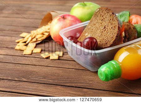 Kid school lunch on wooden background