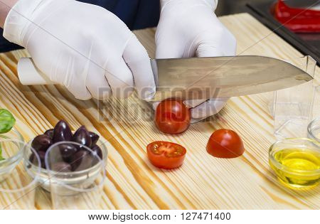 cook prepares canapes in the kitchen at the restaurant