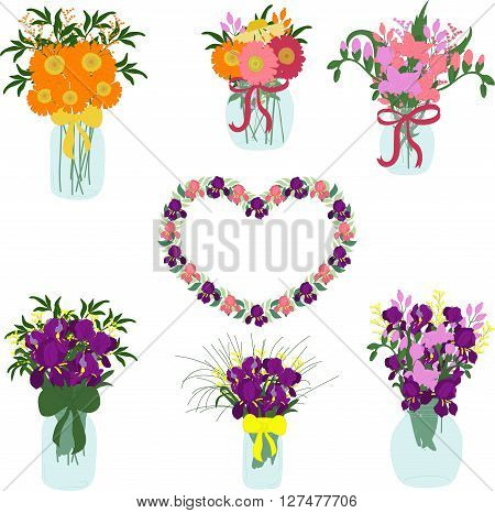 Bouquets of iris, freesia, dahlias, tulips, herbera, lily in jars with bows