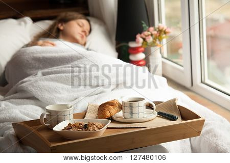Healthy breakfast in the morning served on tray in bed with coffee, cornflakes, croissant and milk
** Note: Soft Focus at 100%, best at smaller sizes