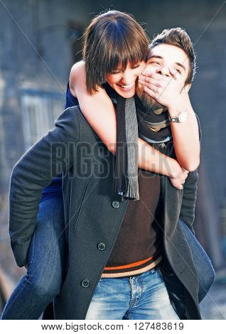 Young couple in love having fun outside