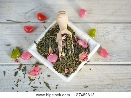 The leaves of green tea on the saucer.