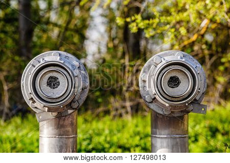 Two oil and gas pipes closed in the middle of the forest for environmental protection reason