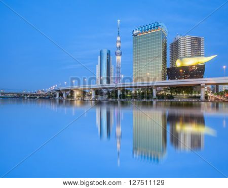 Tokyo Sumida river view with high building and Tokyo Skytree in evening