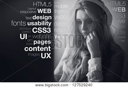 web designer sitting at a desktop computer in the office