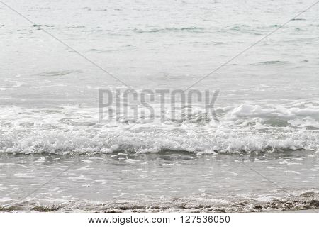 Beautiful white sea wave an dramatic splash