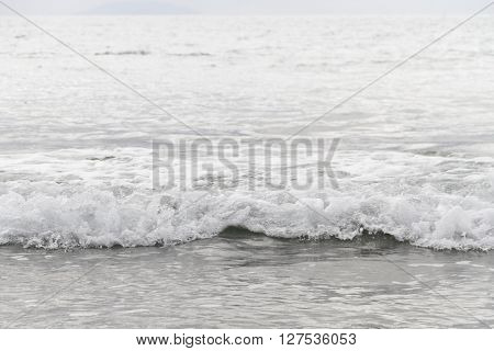 Beautiful white sea wave an dramatic splash