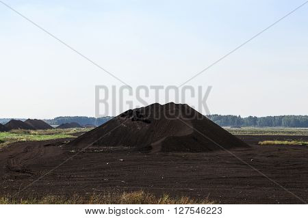 An Area In Which Production Is Carried Black Peat, Peat Mountains