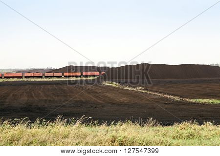 An Area In Which Production Is Carried Black Peat, Peat Mountains