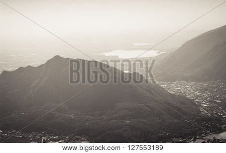 a lush green mountain photographed from Piani d'Erna (part of the Alps) near Lake Como in Italy