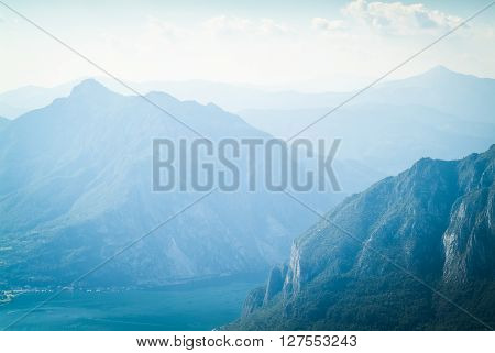 a lush green mountain photographed from Piani d'Erna (part of the Alps) near Lake Como in Italy