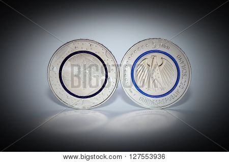 First German five euro coin with blue polymer ring