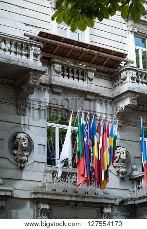 Bergamo Italy - September 9th 2015: photo of various country flags on a building at 110 Viale Papa Giovanni XXIII in Bergamo Italy