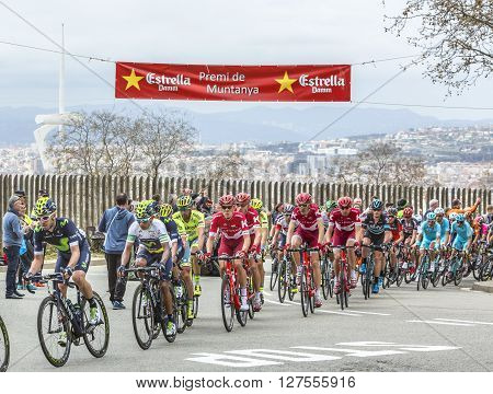 Barcelona Spain - March 27 2016: The peloton riding during Volta Ciclista a Catalunya on the top of Montjuic in Bracelona Spain on March 27 2016.