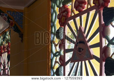 Tay Ninh Vietnam - April 22 2014: artistic decorations in a Caodai temple in Vietnam. Caodai is a Vietnamese religion mixing different religions from around the world
