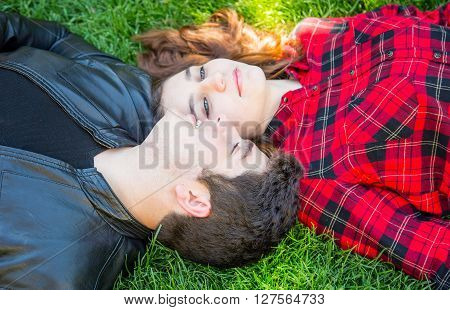 love story boy and girl on the grass