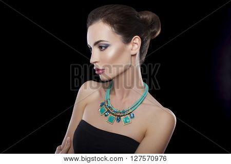 Beautiful Skinny Brunette Woman profile portrait. Beauty Luxury Makeup and Black Dress. Gorgeous Fashion Model Girl Portrait Isolated on a white background.