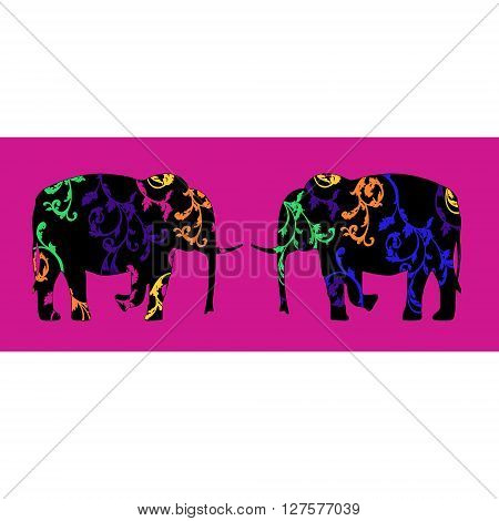 pair of elephants decorated with floral ornaments
