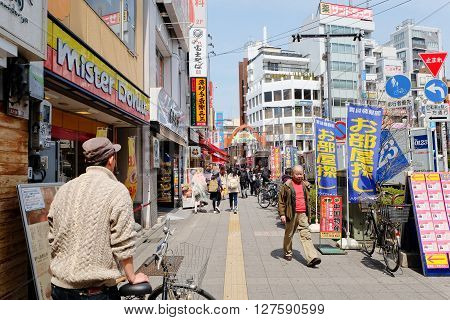 TOKYO - MARCH 31, 2016: lifestyle around Koenji Station on MARCH 31,2016 in Tokyo. Koenji is famous firstly as a center of alternative youth culture,in particular for its second-hand clothing stores