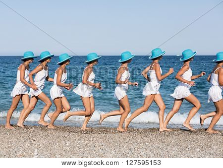 Woman running on the beach. Multiple exposure shot.