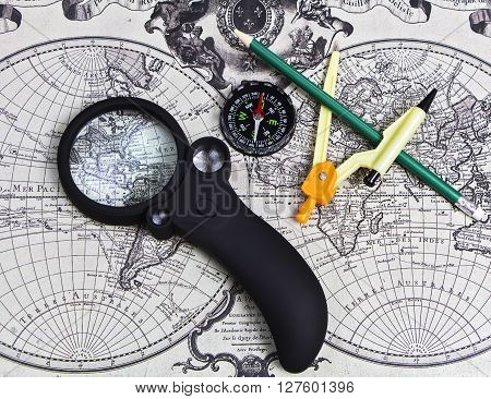 A set of tools for travel on the background of the world map.