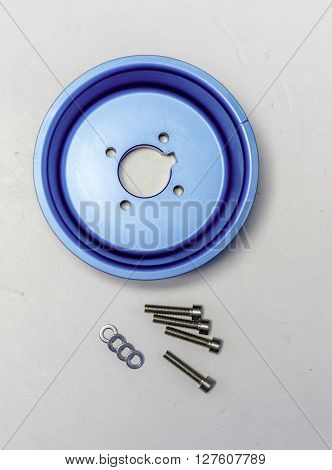 ergal blue pulley with screws on white backdrop