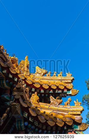 Coloured glaze made of statue on ancient imperial roof decorations Beijing China