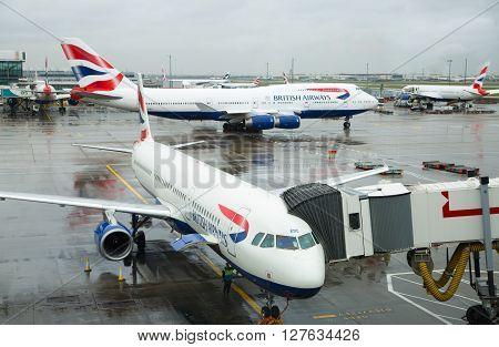 LONDON, UK - APRIL 7, 2016: British Airways plane in the Heathrow airport terminal 5 getting ready to depart