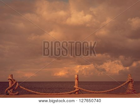 Seafront and cloudy sky in autumn. Turkey Erdek coast of Marmara. Toned landscape.