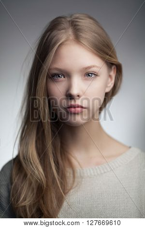 very beautiful blond teen girl with long hair