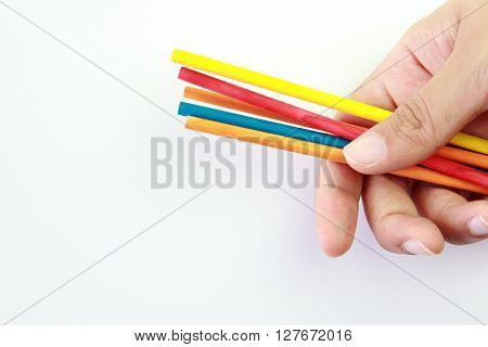 Thinking the best color/ holding the colored stick