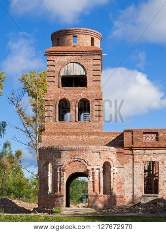The ruins of the old church built of brick. Photo taken on a sunny day