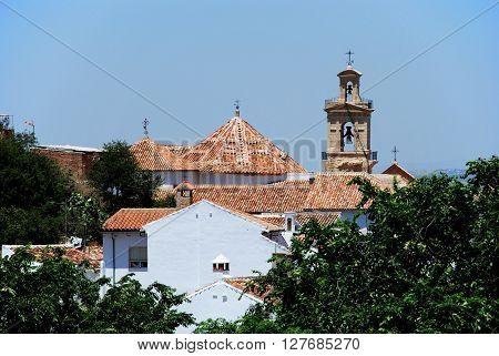 View over town rooftops towards a church Antequera Malaga Province Andalucia Spain Western Europe.
