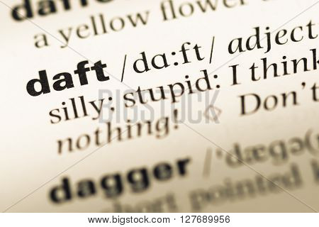 Close Up Of Old English Dictionary Page With Word Daft.
