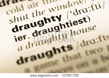 Close Up Of Old English Dictionary Page With Word Draughty.