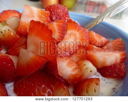 Bowl Of A Yoghurt With Strawberries