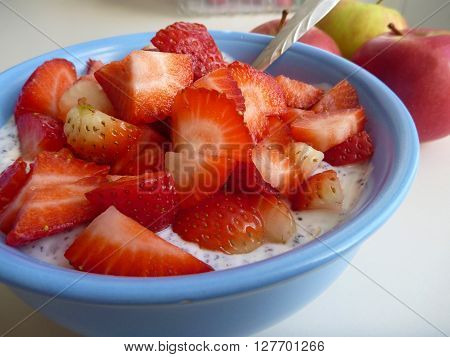 Bowl Of A Yoghurt With Strawberries