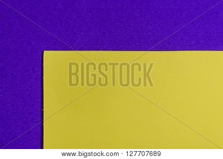 Eva foam ethylene vinyl acetate smooth lemon yellow surface on purple sponge plush background