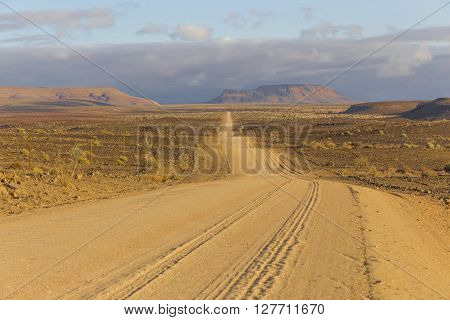 The C12 scenic dirt road in the desert leading to the Fish River Canyon Namibia