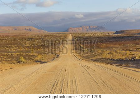 The C12 scenic dirt road in the desert leading to the Fish River Canyon Namibia