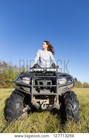 Elegant Woman Riding Extreme Quadrocycle Atv