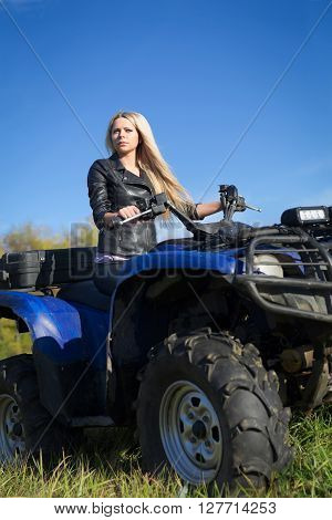 Elegant Woman Riding Extreme Quadrocycle Atv