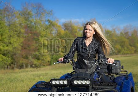 Elegant Woman Riding Extreme Quadrocycle Atv