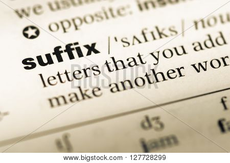 Close Up Of Old English Dictionary Page With Word Suffix.