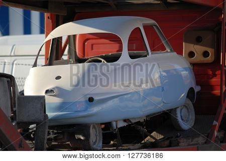 ANKARA/TURKEY-APRIL 28, 2016: Classic vantage tricar on the towing vehicle of Sasmaz Industrial Zone.April 28, 2016-Ankara/Turkey