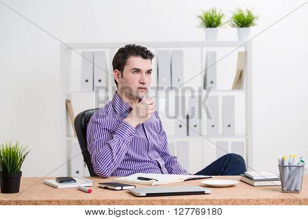 Young Businessman Drinking Coffee