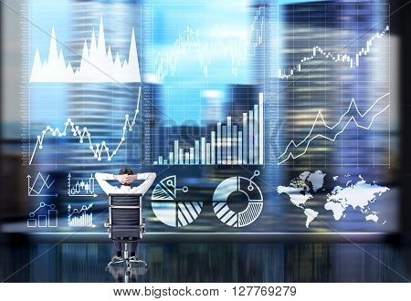 Businessperson with hands on head sitting in front of business chart and cityscape. Double exposure
