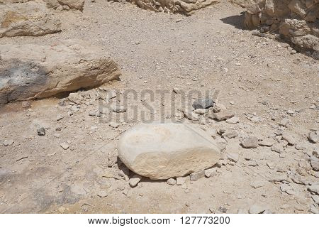 Stone reservoir for the dew water in Moa fortress, ancient ruined building in South Israel