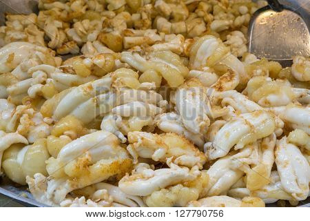Some of fried squid eggs on the big pan.